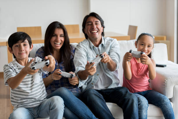 istock Family playing video games 646688628