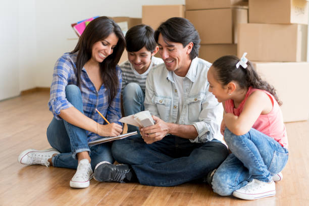 istock Family moving home and talking 646688684