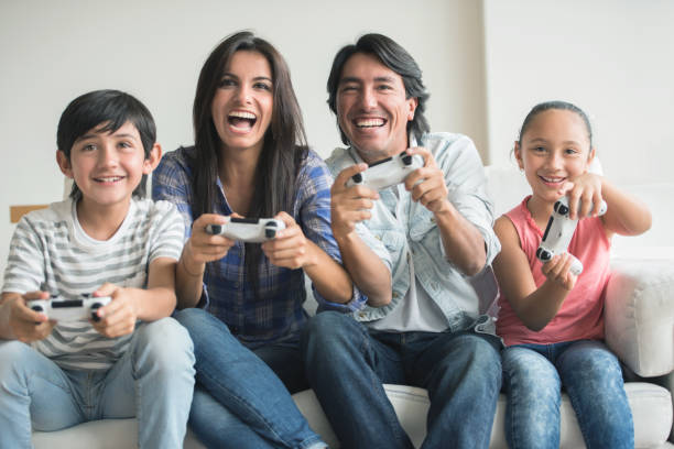 istock Family playing video games 646688754