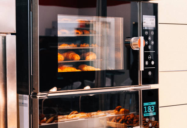 istock Croissants in a bakers oven 646699454