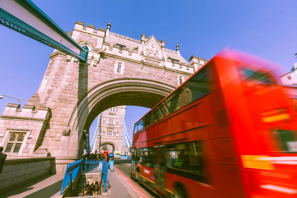 istock Blurred red bus on Tower Bridge in London 646726484