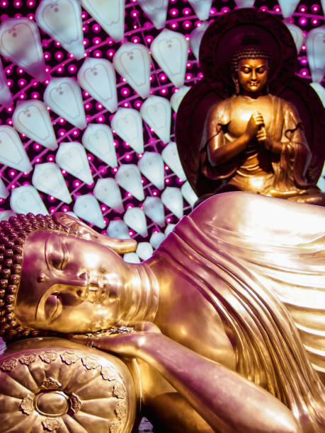 istock Gold Reclining Buddha with Lights 646730796