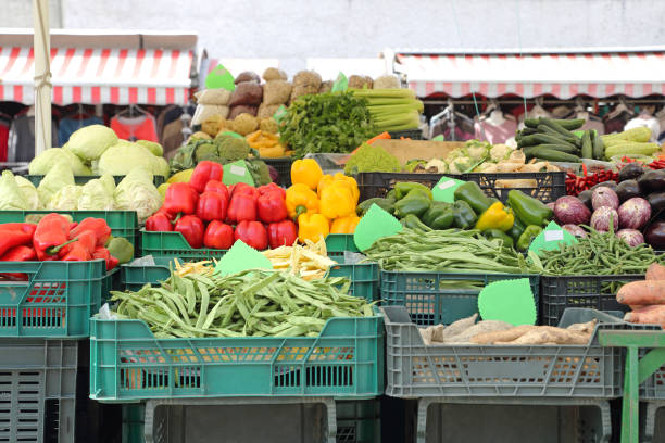 Vegetables in Crates at Farmers Market Stall