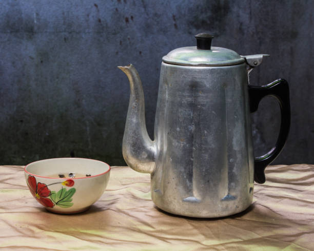 istock still life classic kettle with cup and lamp 646744390