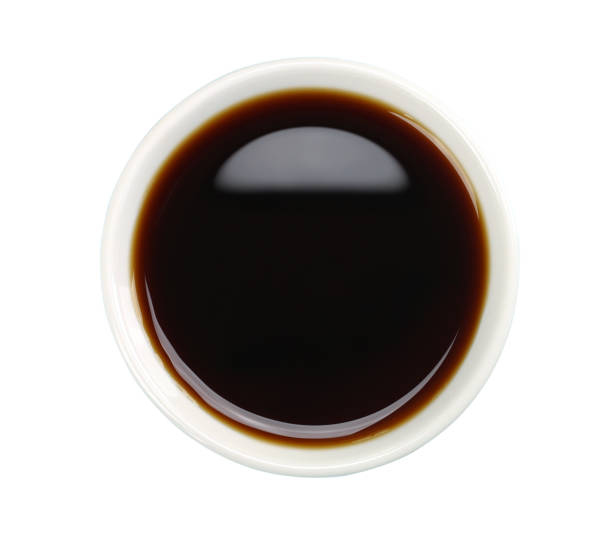 istock Soy sauce in white bowl isolated on background 646757840