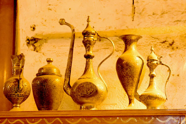 istock Ancient metal jug in oriental style 646763618