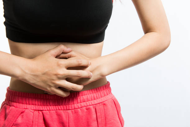 istock Woman suffering from stomach pain 646763644