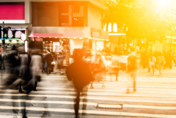 istock Abstract background of people on the street with sunlight 646767708