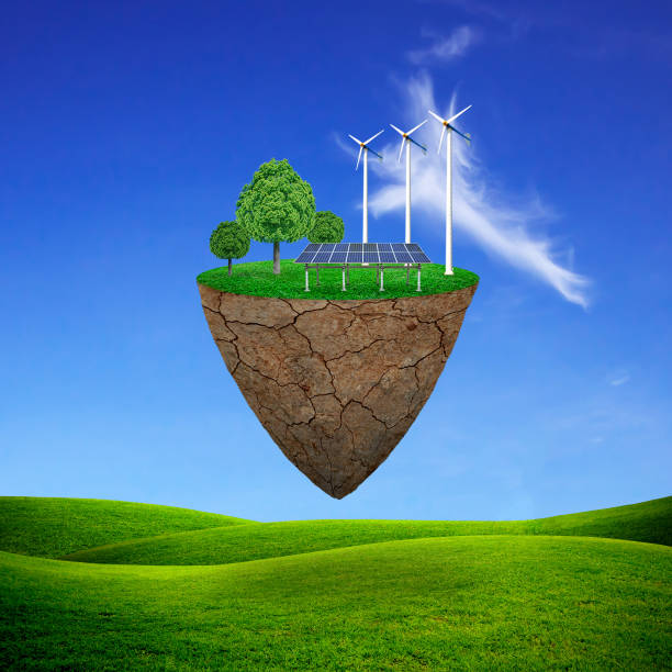 istock wind power station mills and trees on the lawn. Natural concept. 646768108