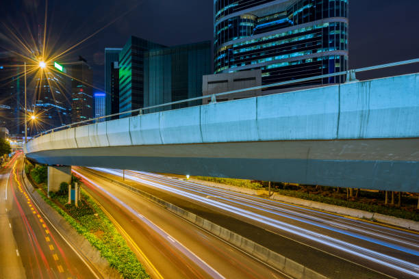 istock urban traffic road with cityscape 646774568