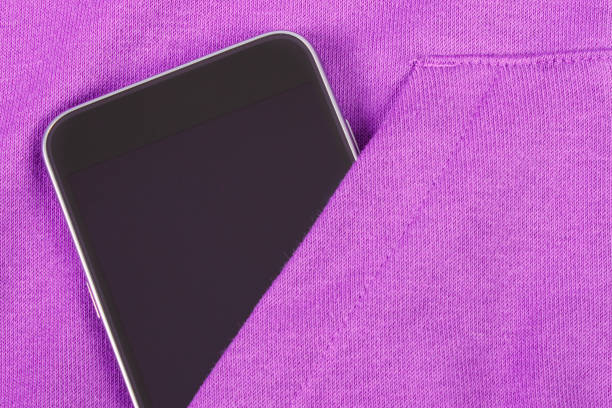 istock Mobile phone with blank screen in pocket sweatshirt, smartphone 646783682