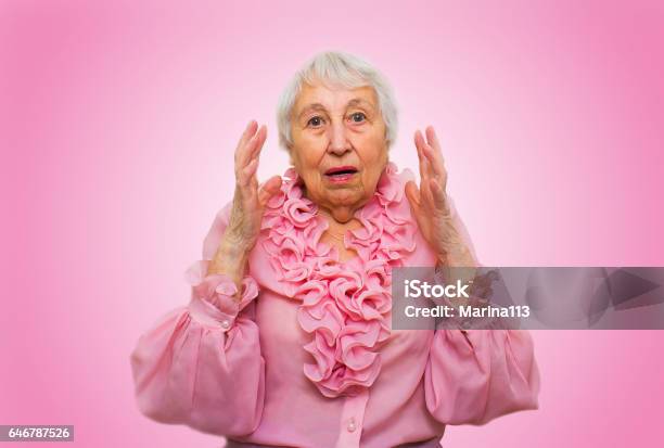 Elderly Surprised Woman Stock Photo - Download Image Now - Only Senior Women, Pointing, Senior Women