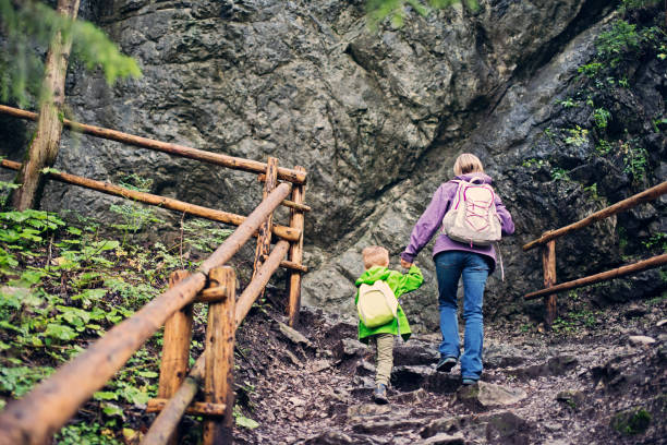istock Mother with her son hiking in mountains 646794712