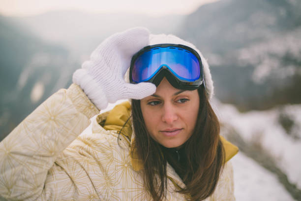 istock girl in a mask for snowboarding 646800716