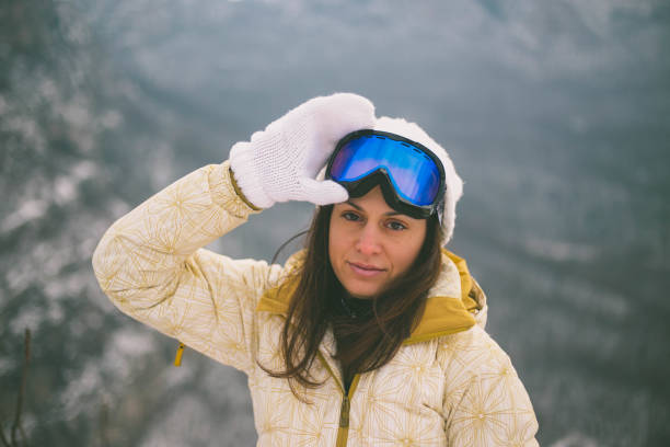 istock girl in a mask for snowboarding 646800756