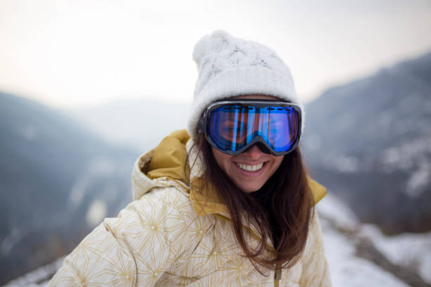istock girl in a mask for snowboarding 646800798