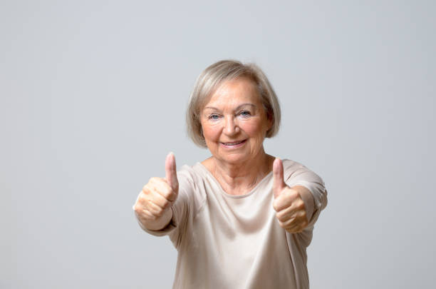 istock Woman showing thumbs up 646808214