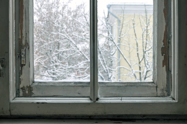 istock Old window of an abandoned building. 646812552