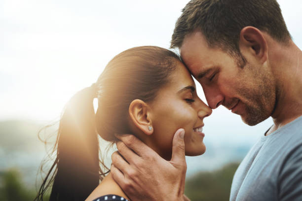 I love you with every beat of my heart Shot of a young couple enjoying a romantic day outdoors falling in love stock pictures, royalty-free photos & images