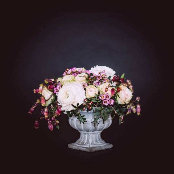 istock Vintage flower bouquet in old style vase 646820642