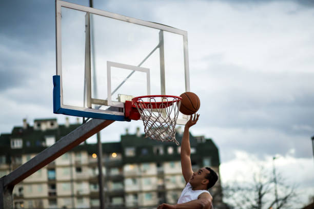 istock Young men playing basketball 646824158