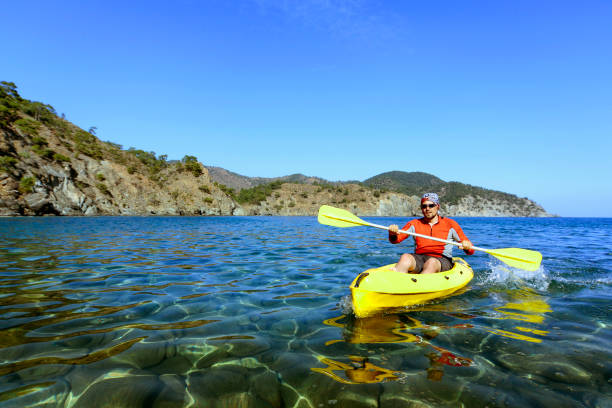 istock Travel by sea kayak on a sunny day. 646824286
