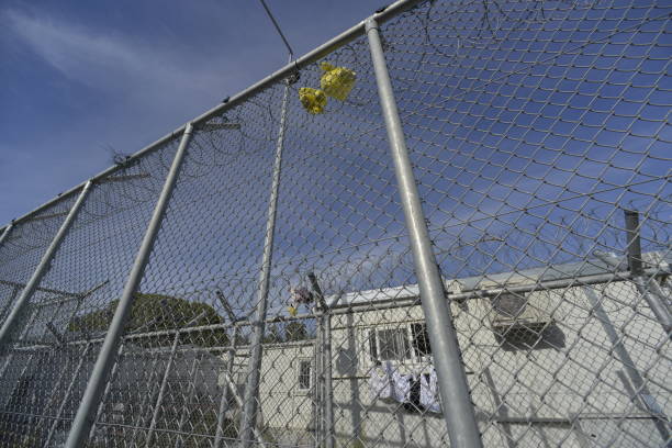 istock fence at refugee camp Moria, Lesvos 646829368