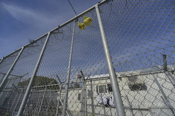 fence at refugee camp Moria, Lesvos stock photo