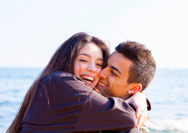 istock Young couple in the beach 646831690