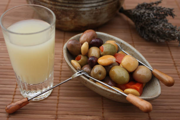 istock Aperitif Pastis Lupins Olives stuffed with red pepper 646839452