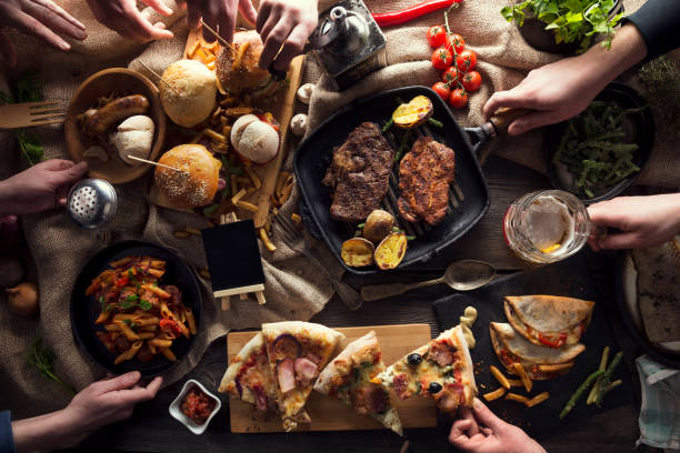 istock Enjoying dinner with friends 646841110