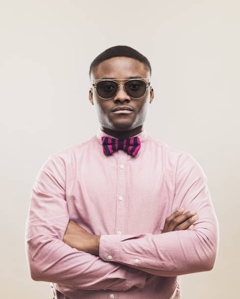 istock Young african man standing with his arms crossed 646851658