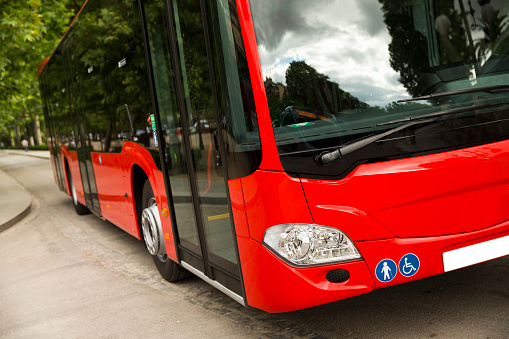 Frankfurt, Germany - November 21, 2022: Driverless transport system on the road in Frankfurt-Riederwald, Germany. The autonomous minibuses with the designation \