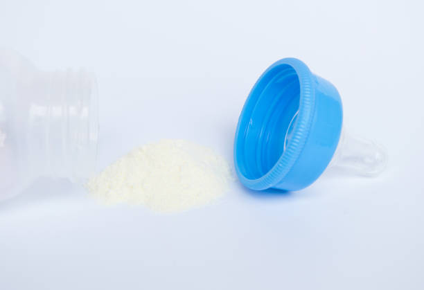 istock powdered milk and baby bottle 646867246