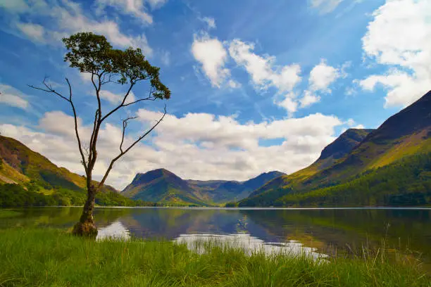 The sun shines down on Buttermere in the English Lake District, Cumbria.