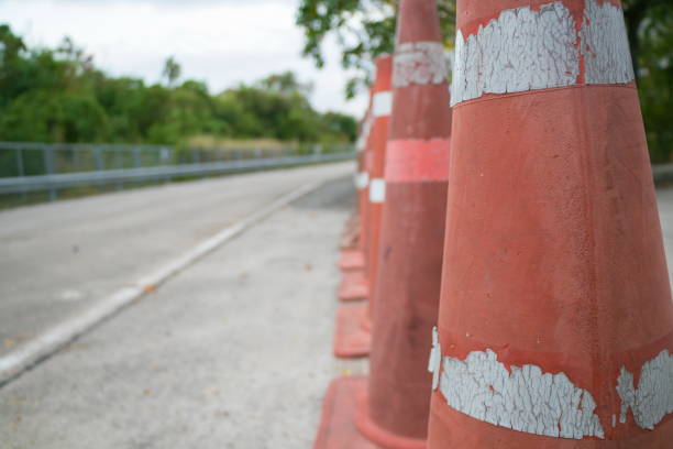 istock Row of orange Traffic cone on roadway 646872504