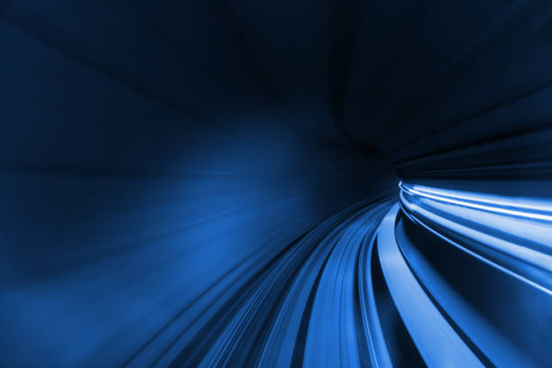 istock Speed blurred motion of train or subway train moving inside tunnel. 646873164