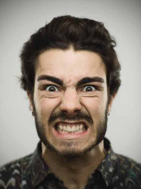 istock Portrait of a real furious man 646876528