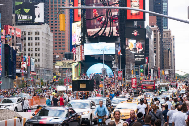 New York City, USA - August 3, 2016: Street Scene Of People And Taxis Bustling In Times Square On 7th Avenue Close To Broadway In Midtown Manhattan