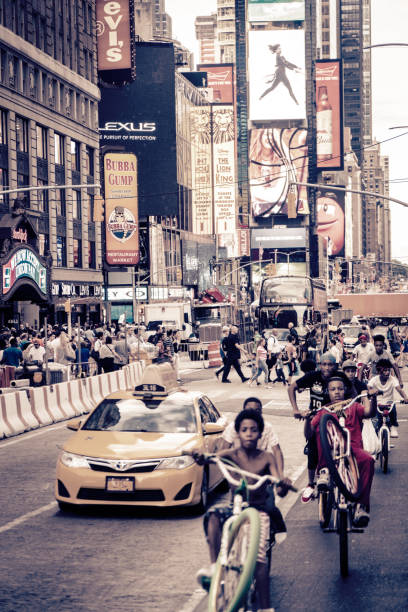 New York City, USA - August 3, 2016: Street Scene Of People And Taxis Bustling In Times Square On 7th Avenue Close To Broadway In Midtown Manhattan