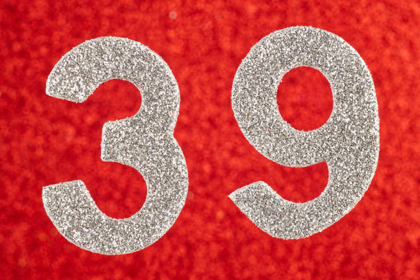 Number thirty-nine silver color over a red background. Anniversary.