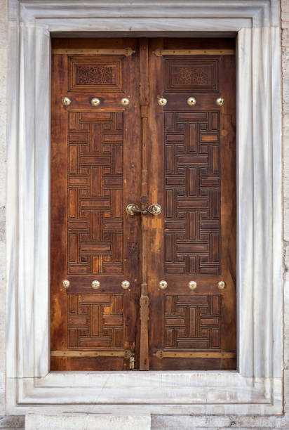 istock An old wood door with metal handle. 646880148