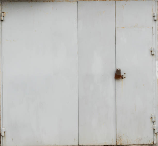 istock old metal warehouse door 646884558