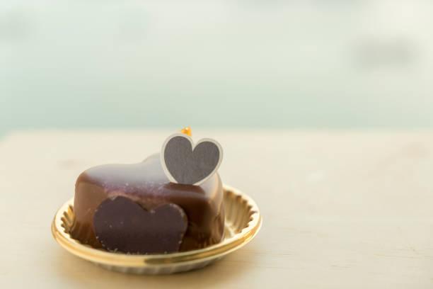 A delicious chocolate truffle on a white background.