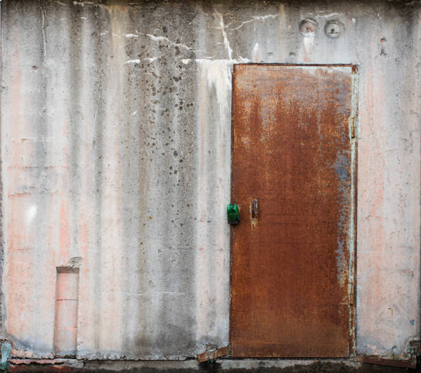 istock old metal warehouse door 646888226