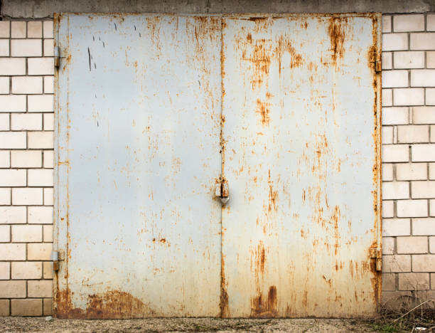 istock old metal warehouse door 646888266