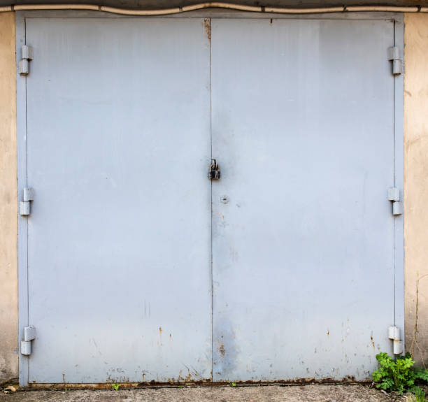 istock old metal warehouse door 646888534