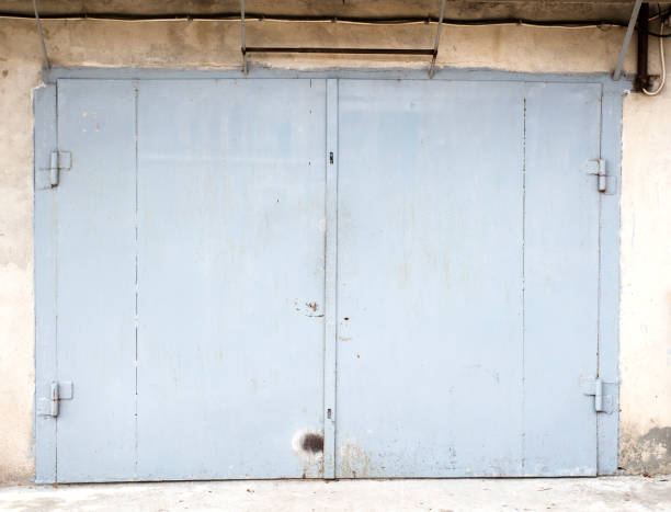 istock old metal warehouse door 646888662