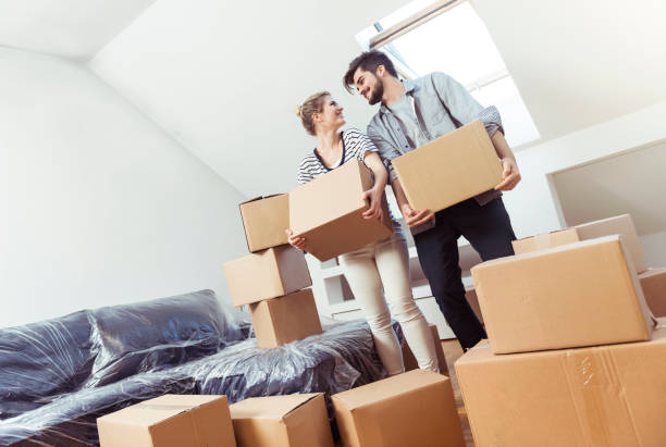 istock Young couple moving into their new home 646898332