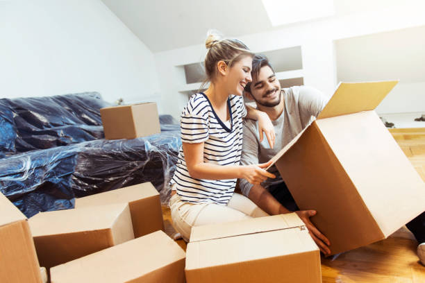istock Young couple moving into their new home 646898402